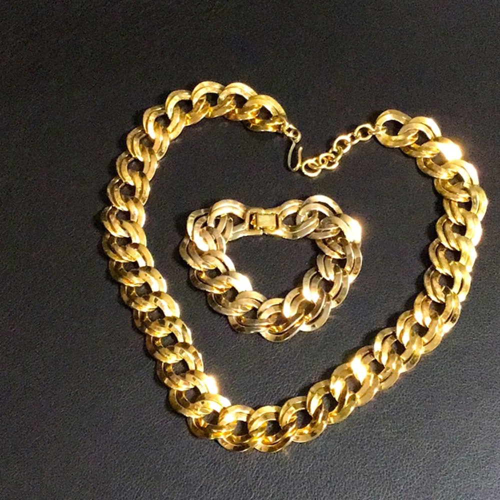Monet gold tone flat curb chain necklace with matching bracelet.